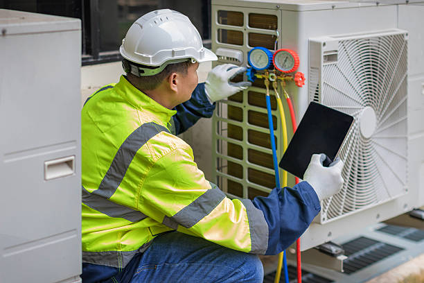 Professional Hvac technician working in Manson, NC